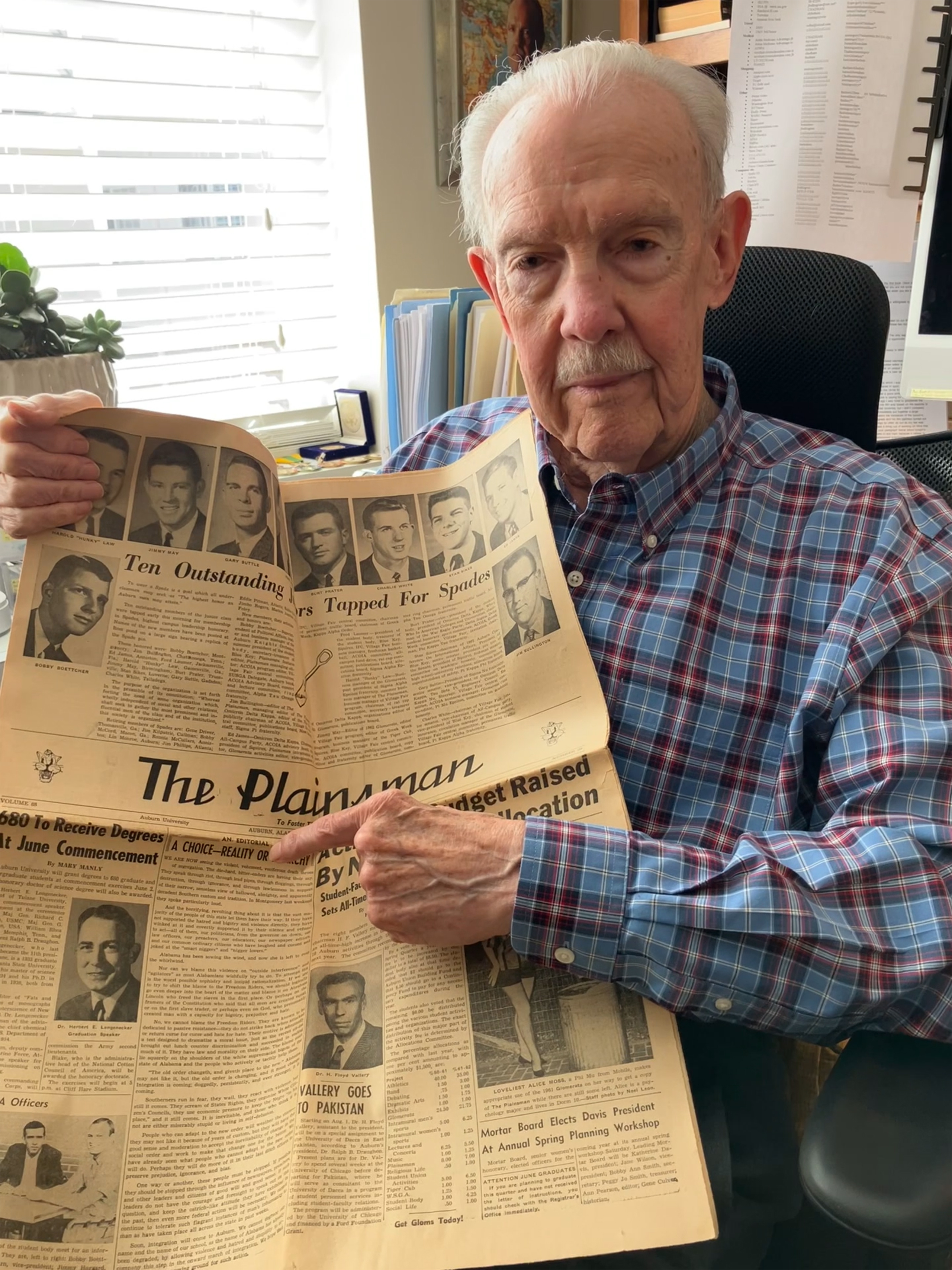 James Bullington holding up his editorial. (Photo courtesy of James Bullington)